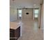 Open living space with tile flooring and lots of natural light coming in through several large windows at 6516 W Madre Del Oro Dr, Phoenix, AZ 85083