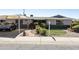 A cozy single-story home boasting a well-kept lawn and covered parking in a tidy neighborhood at 8631 E Vista Dr, Scottsdale, AZ 85250