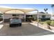 Charming single-story home featuring a covered carport and low-maintenance desert landscaping at 8631 E Vista Dr, Scottsdale, AZ 85250