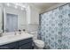 Bathroom with a shower/tub combo and vanity with white countertop at 9628 E Olla Ave, Mesa, AZ 85212