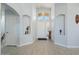 Bright entryway with high ceilings, tile floors, and decorative niches at 9628 E Olla Ave, Mesa, AZ 85212