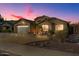 Well-maintained single-story home with attached garage and landscaped yard at 9628 E Olla Ave, Mesa, AZ 85212