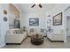Spacious living room with ample seating and natural light at 9628 E Olla Ave, Mesa, AZ 85212