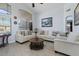 Comfortable living room with ample seating and natural light at 9628 E Olla Ave, Mesa, AZ 85212
