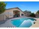 Large backyard pool with flagstone patio and covered patio at 9628 E Olla Ave, Mesa, AZ 85212