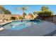 Inviting kidney-shaped pool with ample surrounding patio space at 9628 E Olla Ave, Mesa, AZ 85212