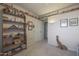 Spacious bedroom with built-in shelving and a giraffe statue at 9821 W Cedar Dr, Sun City, AZ 85351