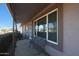 Inviting front porch with a bench and view of the street at 9821 W Cedar Dr, Sun City, AZ 85351