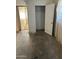 A bedroom with a closet and an adjoining hallway at 10025 N 13Th Pl, Phoenix, AZ 85020