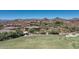 Aerial view of community with mountain backdrop at 10260 E White Feather Ln # 2003, Scottsdale, AZ 85262