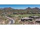 Aerial view of community and surrounding mountains at 10260 E White Feather Ln # 2003, Scottsdale, AZ 85262