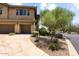 Two-story building with attached garages and landscaping at 10260 E White Feather Ln # 2003, Scottsdale, AZ 85262