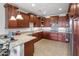 Modern kitchen featuring granite countertops and a breakfast bar at 10260 E White Feather Ln # 2003, Scottsdale, AZ 85262