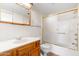 Bathroom with tub shower combo and wood vanity at 10330 W Thunderbird Blvd # C119, Sun City, AZ 85351