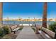 Peaceful walkway with benches overlooking a scenic canal at 10330 W Thunderbird Blvd # C119, Sun City, AZ 85351