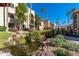 Landscaped courtyard with a charming water feature and walkway at 10330 W Thunderbird Blvd # C119, Sun City, AZ 85351