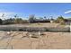 Backyard patio with flagstone and block wall at 10331 W Willie Low Cir, Sun City, AZ 85351