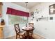 Cozy kitchen nook with a small table and chairs, perfect for casual dining at 10461 W Devonshire Ave, Phoenix, AZ 85037