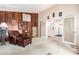 Spacious living room features a view into the kitchen and comfortable seating at 10461 W Devonshire Ave, Phoenix, AZ 85037