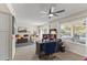 Bright home office features built-in shelving and view of living room at 10631 W Brookside Dr, Sun City, AZ 85351