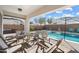 Inviting backyard oasis with a sparkling pool and patio furniture at 10713 E Hawk Ave, Mesa, AZ 85212