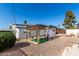 Backyard with a pergola and patio area, perfect for relaxation at 1121 S Lawther Dr, Apache Junction, AZ 85120