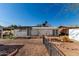 Spacious backyard with a pergola, artificial turf, and garden at 1121 S Lawther Dr, Apache Junction, AZ 85120