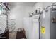 Laundry room with washer, dryer, and water heater at 1121 S Lawther Dr, Apache Junction, AZ 85120