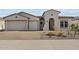 Charming single-story home with a three-car garage and well-maintained desert landscaping at 12316 W Parkway Ln, Avondale, AZ 85323