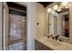 Bathroom with a bathtub and marble vanity top at 1308 E Gardenia Dr, Phoenix, AZ 85020