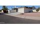 Mid-century modern home with attached garage at 1308 E Gardenia Dr, Phoenix, AZ 85020