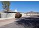 View of home from the street, mountain backdrop at 1308 E Gardenia Dr, Phoenix, AZ 85020