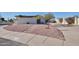 House exterior with landscaped yard and driveway at 1308 E Gardenia Dr, Phoenix, AZ 85020