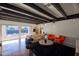 Living area with pool view, and mid-century modern decor at 1308 E Gardenia Dr, Phoenix, AZ 85020