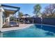 Relaxing pool area with patio furniture and pergola at 1308 E Gardenia Dr, Phoenix, AZ 85020