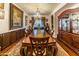 Formal dining room with a large table and hutch at 13210 W Palo Verde Dr, Litchfield Park, AZ 85340