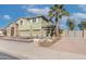 Two-story house with three-car garage and desert landscaping at 13210 W Palo Verde Dr, Litchfield Park, AZ 85340