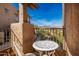 Balcony with ornate table and chairs, offering mountain views at 13840 N Mirage Heights W Ct # 217, Fountain Hills, AZ 85268