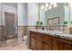 Bathroom with granite vanity and tiled floors at 14179 E Kalil Dr, Scottsdale, AZ 85259