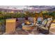 Relaxing outdoor fire pit area with seating at 14179 E Kalil Dr, Scottsdale, AZ 85259