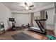 Home gym with exercise equipment and wood floors at 14179 E Kalil Dr, Scottsdale, AZ 85259