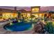 Expansive pool and spa with a mountain backdrop at 14179 E Kalil Dr, Scottsdale, AZ 85259