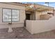 Condo entrance with covered walkway and small garden at 14300 W Bell Rd # 326, Surprise, AZ 85374