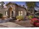 Evening view of house, showcasing its architectural details and landscaping at 14300 W Bell Rd # 326, Surprise, AZ 85374