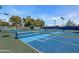 Well-maintained tennis and pickleball courts at 14300 W Bell Rd # 326, Surprise, AZ 85374