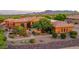 Aerial view of a luxurious home with a pool and landscaped grounds at 14521 E Desert Vista Trl, Scottsdale, AZ 85262