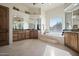 Elegant bathroom with double vanity, soaking tub, and large window at 14521 E Desert Vista Trl, Scottsdale, AZ 85262