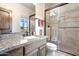 Bathroom with granite vanity and a large walk-in shower at 14521 E Desert Vista Trl, Scottsdale, AZ 85262