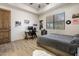 Spacious bedroom with wood-look floors and a comfortable bed at 14521 E Desert Vista Trl, Scottsdale, AZ 85262