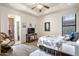 Bedroom with a cozy sitting area and en-suite bathroom at 14521 E Desert Vista Trl, Scottsdale, AZ 85262